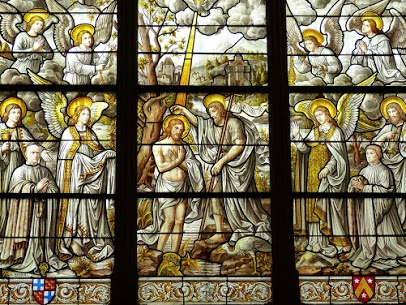 A picture of a stained glass at the parish church